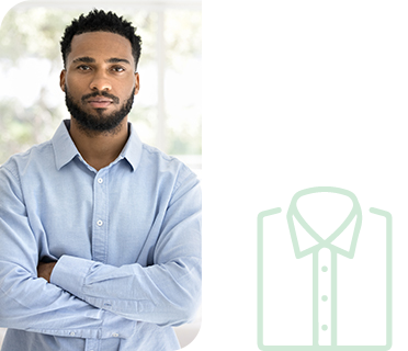 Serious African freelance business man in office shirt standing indoors